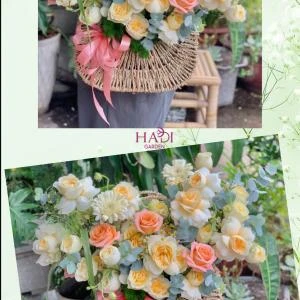 24082611 - Giỏ hoa tone vàng pastel