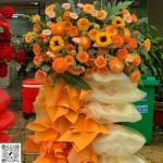 1410202620 - kệ hoa tone cam vàng rực rỡ