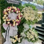 25102503 - Kệ hoa chia buồn mix lan tím