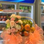 14112531 - giỏ hoa mix trái cây tone hồng