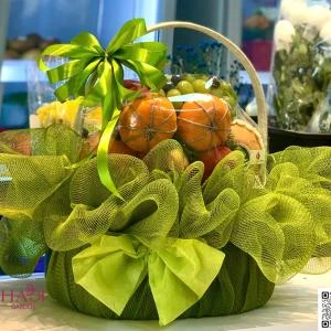 14112502 - giỏ trái cây tone xanh bơ