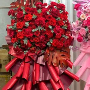 21012603 - kệ hoa khai trương tone đỏ